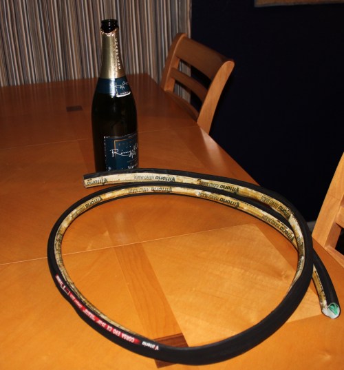 Astana champagne bottle and Lance's bike tire